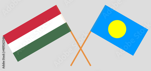 Crossed flags of Hungary and Palau. Official colors. Correct proportion