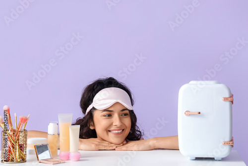 Young smiling woman with sl...
