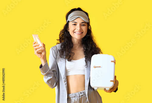 Young smiling woman in paja...