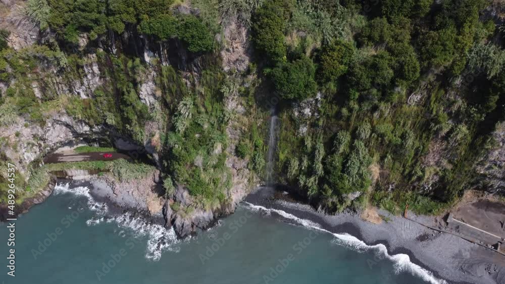 Amazing aerial drone view of the ocean and cliffs. A car appears from the tunnel and passes on the road next to the ocean. Beautiful blue ocean water. Travel the world and discover beautiful nature.
Amazing aerial drone view of the ocean and cliffs. A car appears from the tunnel and passes on the road next to the ocean. Beautiful blue ocean water. Travel the world and discover beautiful nature.