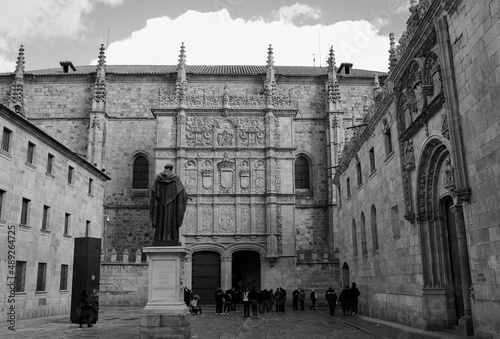 Salamanca, Spain 04th april 2018. View of the facade of the University of Salamanca which is the oldest in Spain and one of the oldest in Europe. In front of the facade the statue of Fray Luis de Leon