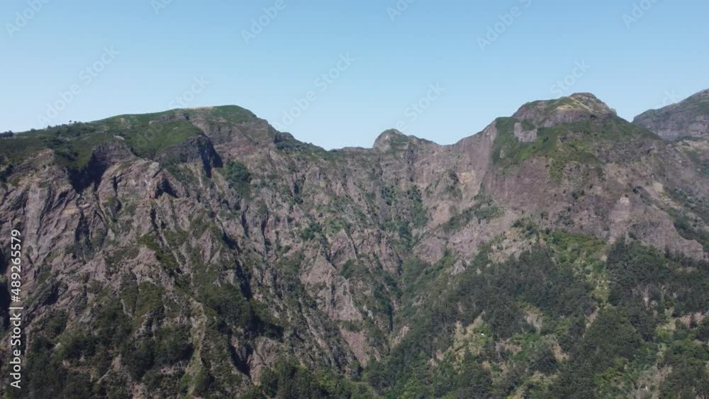 Aerial drone view of mountains on a sunny day. Beautiful panoramic view of different mountain peaks. Travel the world and see the beauty of nature.
Aerial drone view of mountains on a sunny day. Beautiful panoramic view of different mountain peaks. Travel the world and see the beauty of nature.