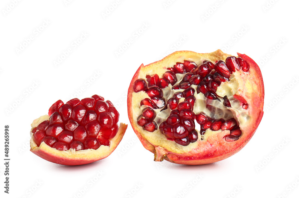 Tasty pomegranate pieces on white background Tasty pomegranate pieces on white background
