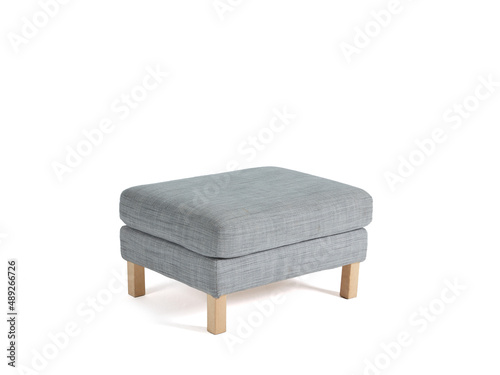 Grey pouf chair isolated on white background.