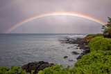 Rainbow on beach in Maui after storm