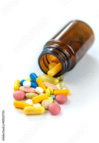 Supplements and vitamins on a white background. Selective focus.
