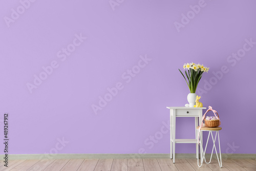 Basket with Easter eggs, bu...