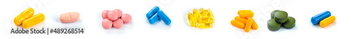 Obraz na płótnie Supplements and vitamins on a white background. Selective focus.