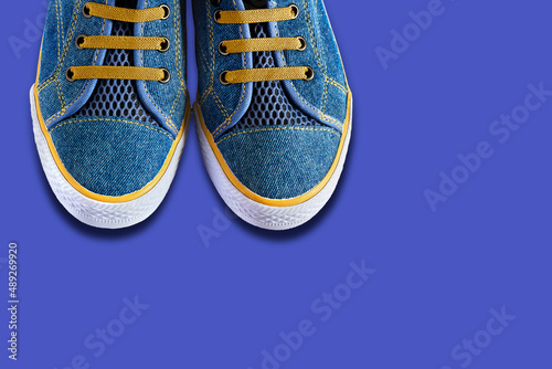 Hipster sneakers on a light trendy background