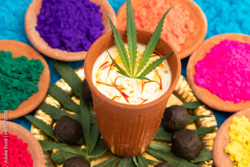 Special Indian Beverage Called Shahi Bhaang Thandai is Cannabis Infused Cooling Drink Made Of Bhang, Milk, Soaked In Dry Fruits Like Almonds Badam Pista Aniseed Rose Petals