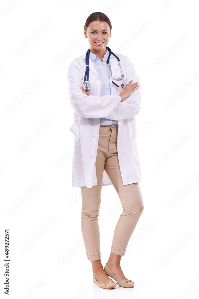 Confident in her career. Portrait of a beautiful doctor standing with arms folded against a white background. Confident in her career. Portrait of a beautiful doctor standing with arms folded against a white background.