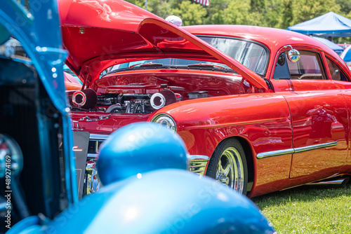 Classic automobiles shine bright at an outdoor car show photo