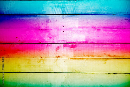 Rainbow colors, wood or wooden plank background or backdrop, fence pickets, board or boards, great background for flatlays or knolling  photo