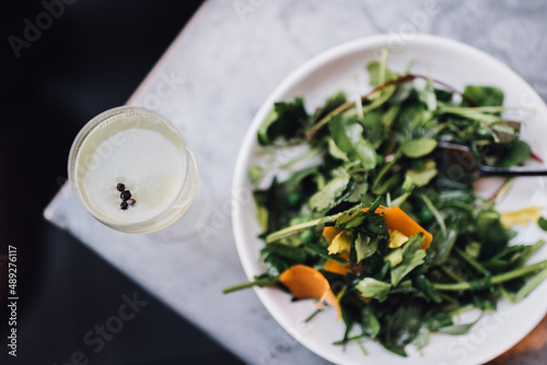 wild watercress salad with peas and orange mimolette cheese