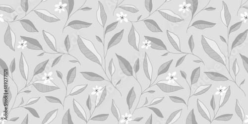 Seamless pattern with leaves and little flowers. Vector elegant floral background.