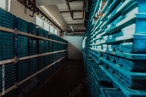 Gold mining storage rock core samples geology drilling industy. Large ore warehouse in modern industry, ores stacked in boxes. Selective focus 