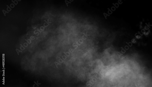 Smoke flowing on black background for Halloween or tough overlay and texture.