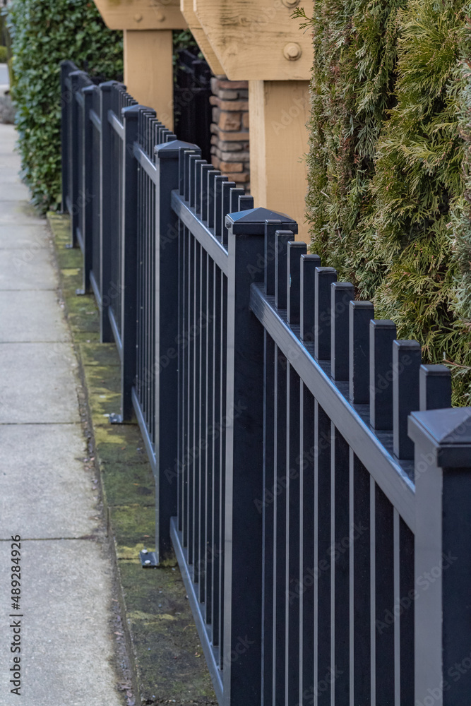 Black Aluminum Fence in city. Iron wrought fence Black Aluminum Fence in city. Iron wrought fence