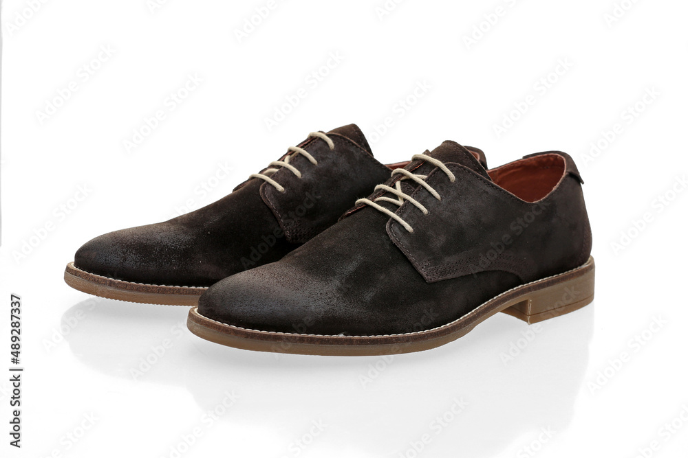 Male brown leather shoes on white background, isolated product. Male brown leather shoes on white background, isolated product.