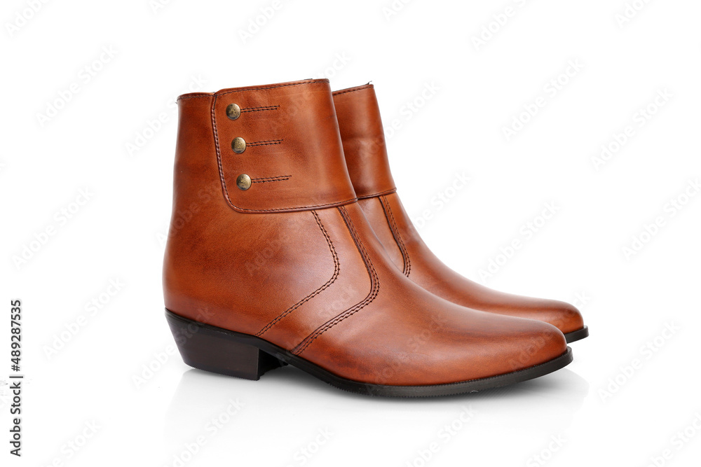 Male brown leather boot on white background, isolated product. Male brown leather boot on white background, isolated product.
