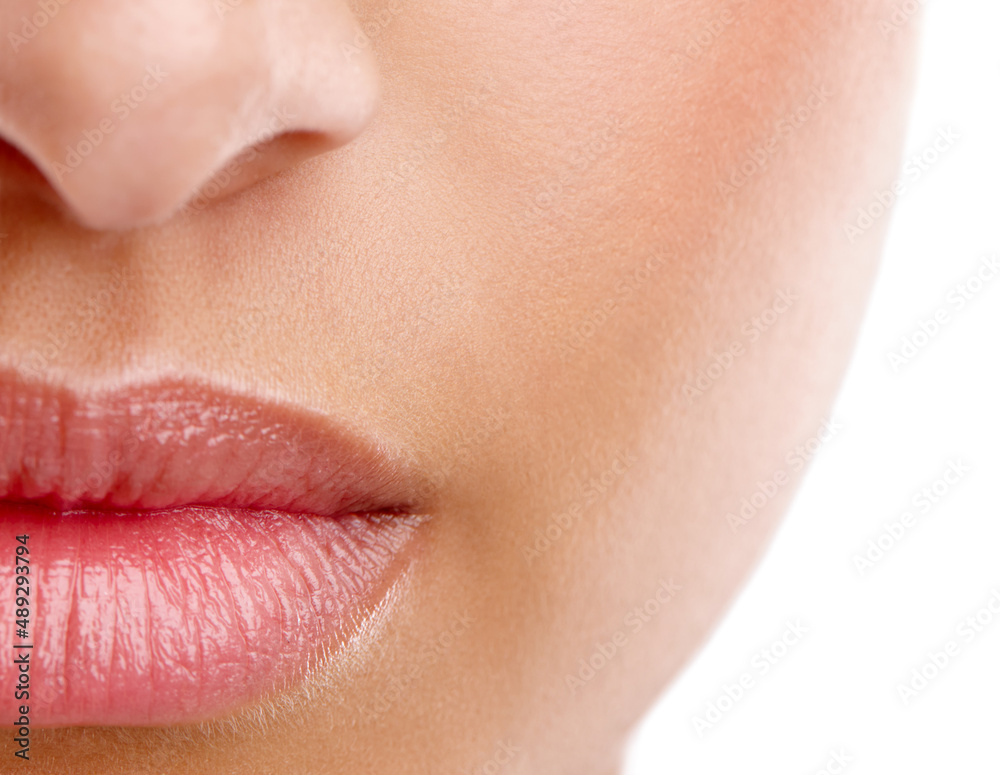 Now those are luscious lips. Closeup studio shot of a beautiful young womans mouth with lipstick applied. Now those are luscious lips. Closeup studio shot of a beautiful young womans mouth with lipstick applied.