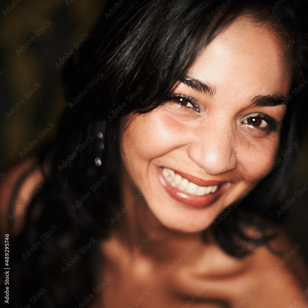 She feels the attraction. Closeup portrait of a beautiful young girl smiling at you. She feels the attraction. Closeup portrait of a beautiful young girl smiling at you.