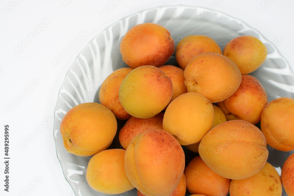 Ripe delicious apricots close up