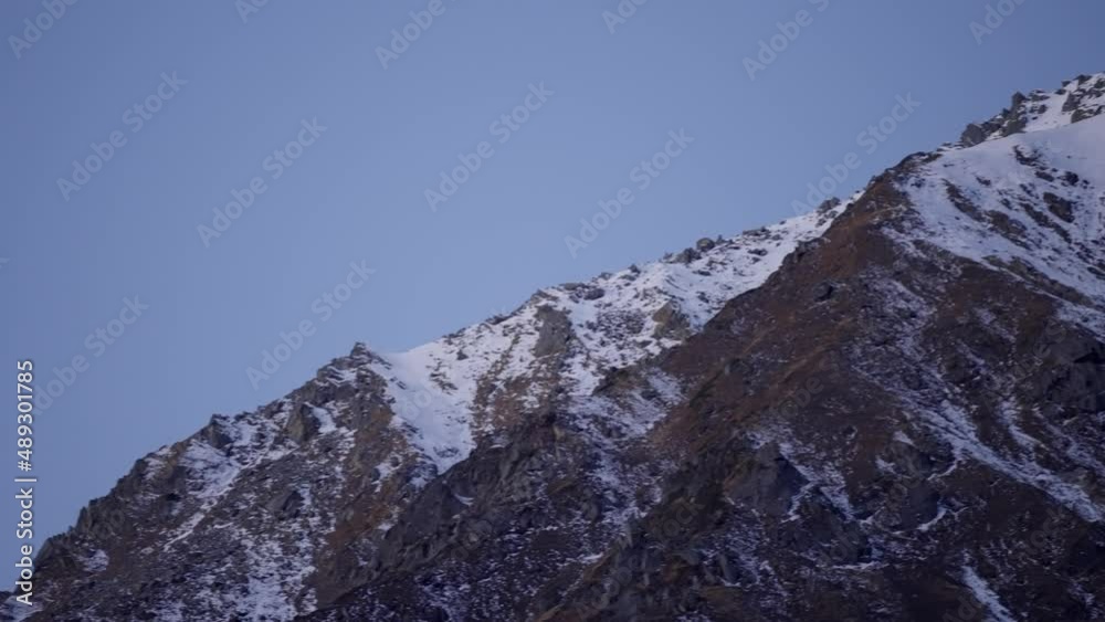 Rocky Mountain Of Kedarnath With Snow At Winter In Uttarakhand, India. pan left Rocky Mountain Of Kedarnath With Snow At Winter In Uttarakhand, India. pan left