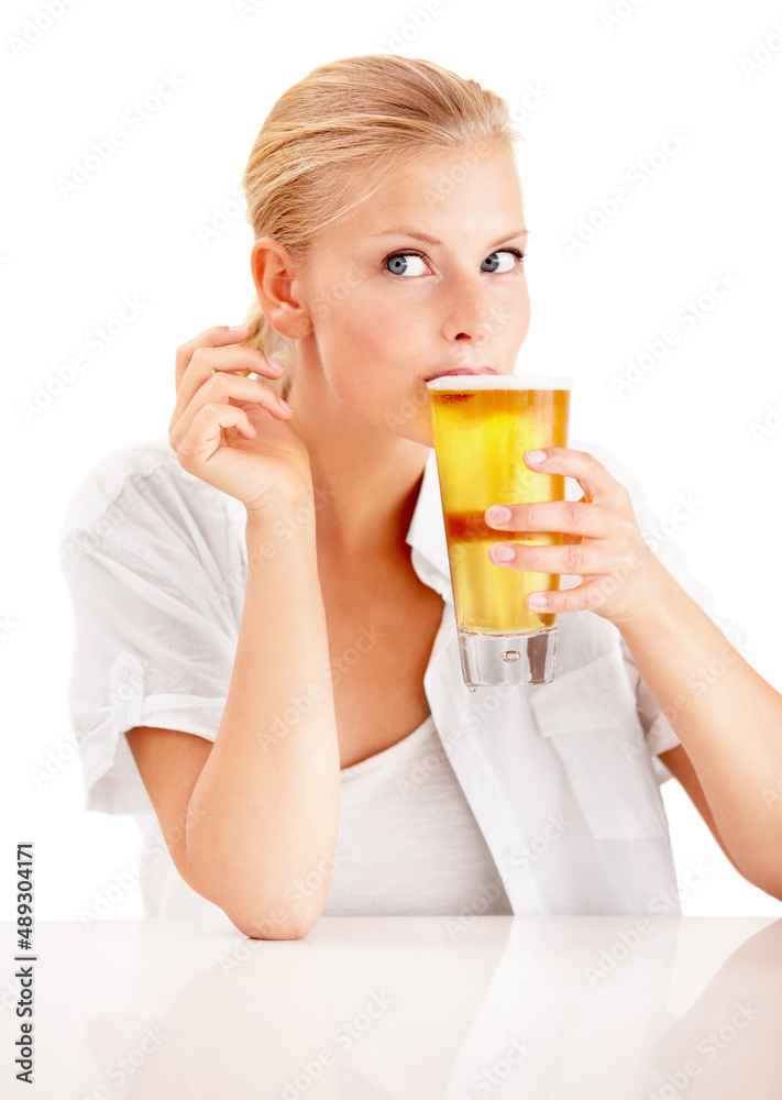 Get refreshed. Shot of a young woman enjoying a drink. Get refreshed. Shot of a young woman enjoying a drink.