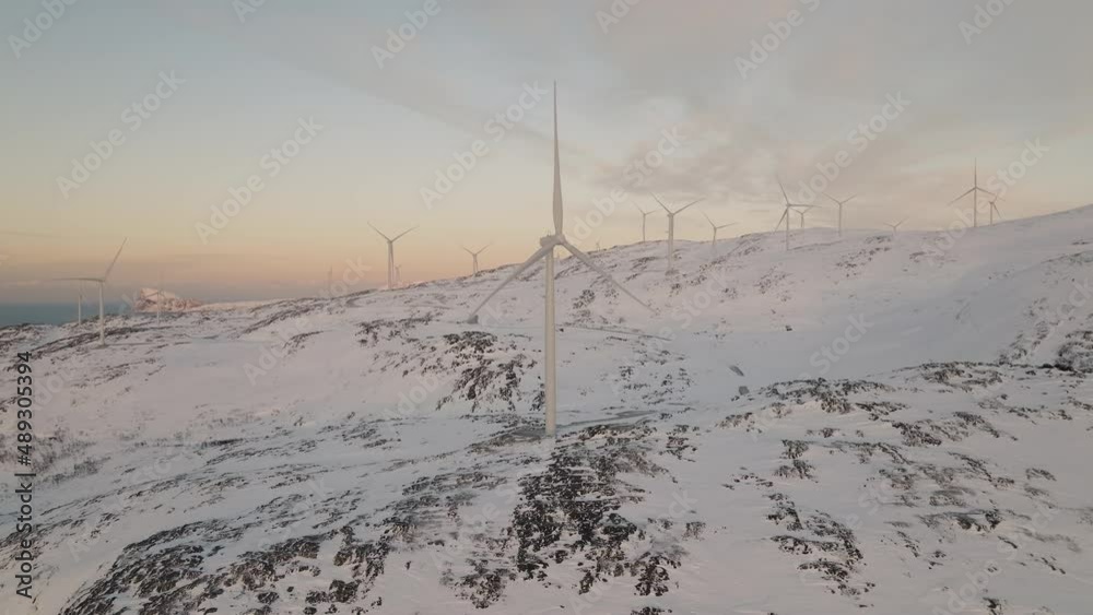 Wind Turbine Energy Farm Erected On Snowy Mountain In Lapland, Aerial Wind Turbine Energy Farm Erected On Snowy Mountain In Lapland, Aerial