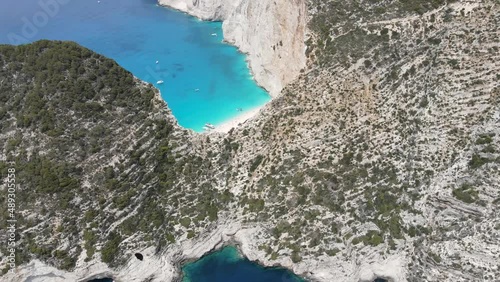 Aerial view of a paradisiac beach with turquoise water and a shipwreck ship (The Panagiotis) on the coast of Zakynthos, in the Ionian Islands of Greece. photo