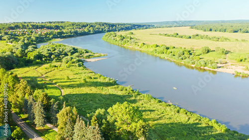 Fototapeta Naklejka Na Ścianę i Meble -  Beautiful summer aerial footage of the Oka river, Tarusa, forests, rivers and fields Russia