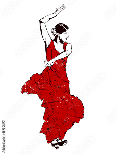 Spanish girl in red dress dances a flamenco