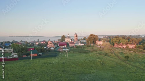 Wallpaper Mural Early morning, fog in the fields, Christian church in the morning mist, Beautiful summer aerial footage, cities of Russia Torontodigital.ca