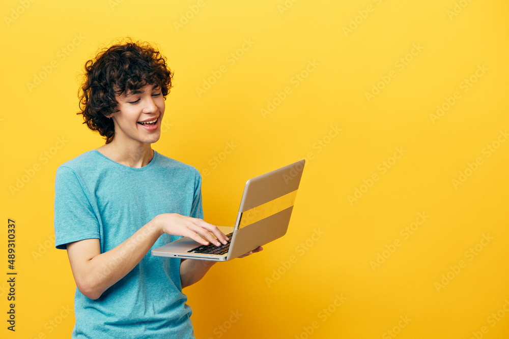 man with laptop work online finance yellow background man with laptop work online finance yellow background