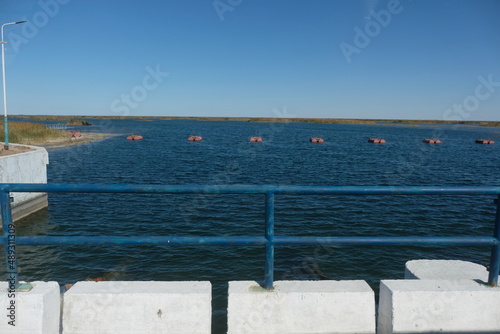 Aralsk, Kazakhstan - 10.06.2020 : The territory of the Kokaral dam. Regulation of the water level in the small Aral Sea. photo