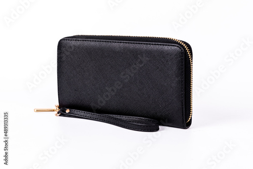 A black leather bag on a white background