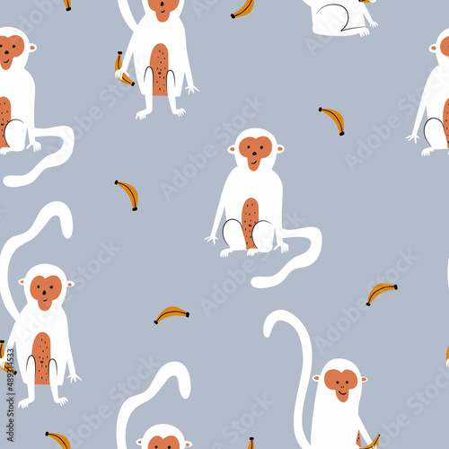Seamless pattern. Colorful cute monkeys on a light blue background. Vector illustration for design