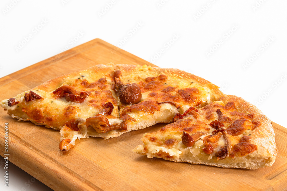 Food concepts. Upper Closeup View of Traditional Freshly Baked Cheese and Mushrooms Pizza On Woden Plate. Food concepts. Upper Closeup View of Traditional Freshly Baked Cheese and Mushrooms Pizza On Woden Plate.