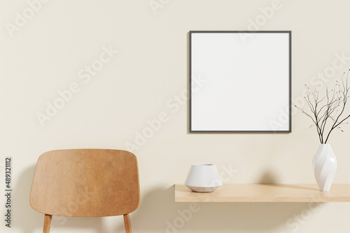 Minimalist and clean square black poster or photo frame mockup on the wooden table in living room © CreatifyStudio