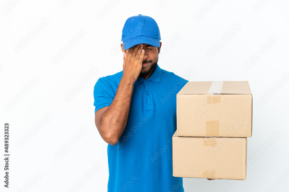 Delivery Ecuadorian man isolated on white background with tired and sick expression Delivery Ecuadorian man isolated on white background with tired and sick expression