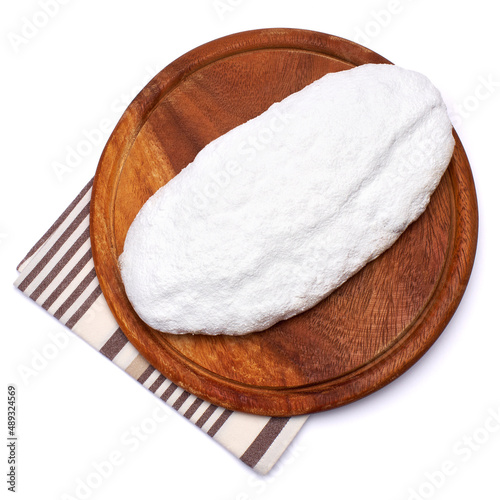 Traditional Christmas stollen cake with marzipan and dried fruit isolated on white background