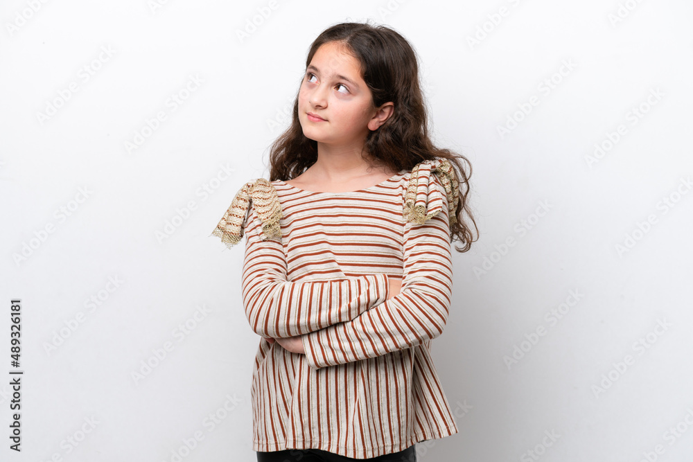 Little girl isolated on white background looking to the side Little girl isolated on white background looking to the side