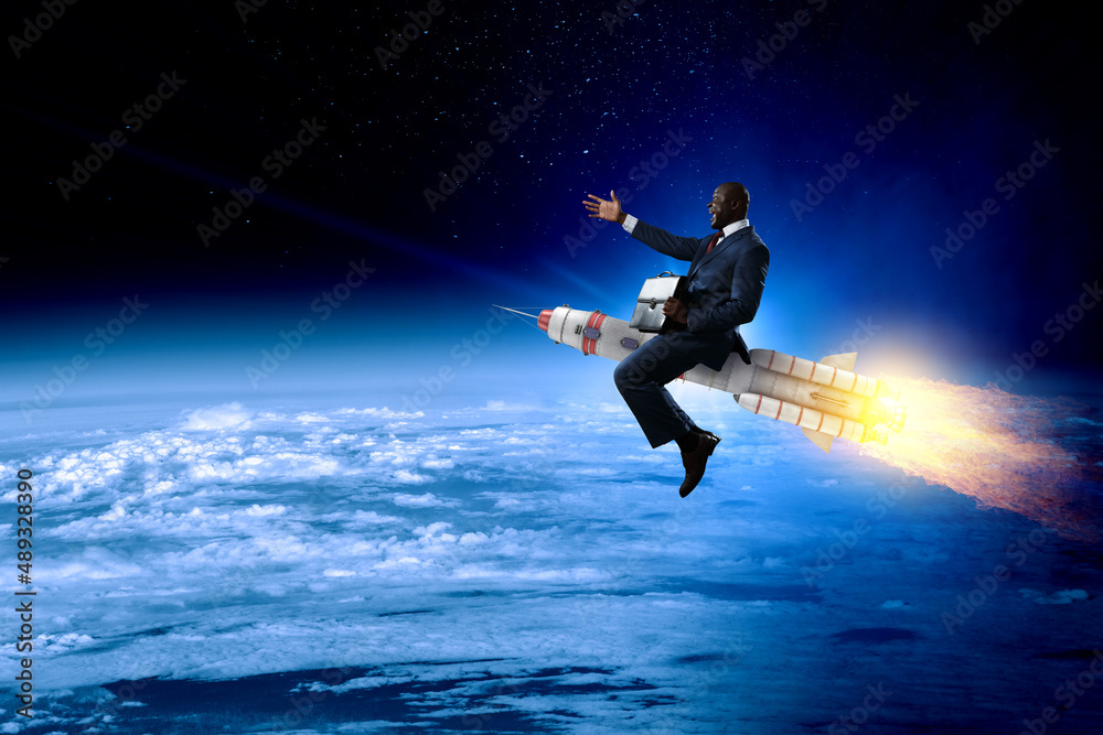 Businessman on a rocket . Mixed media