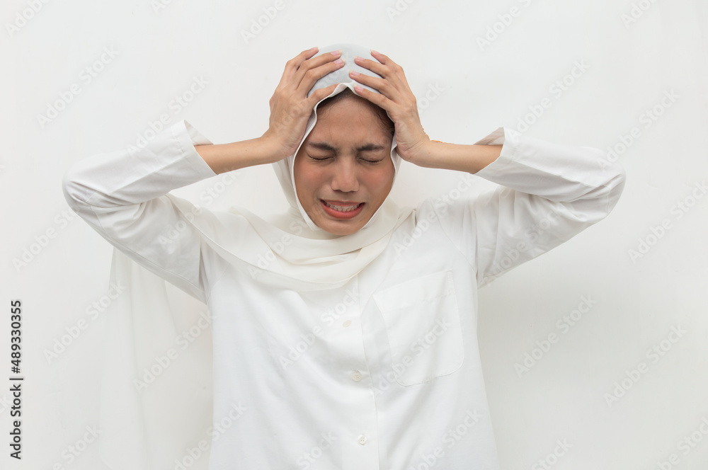 stressed sick muslim woman with headache; ill woman suffers from vertigo, dizziness, migraine, hangover, stressed sick muslim woman with headache; ill woman suffers from vertigo, dizziness, migraine, hangover,