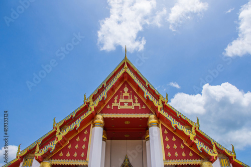Temple roof with blue sky in Thailand