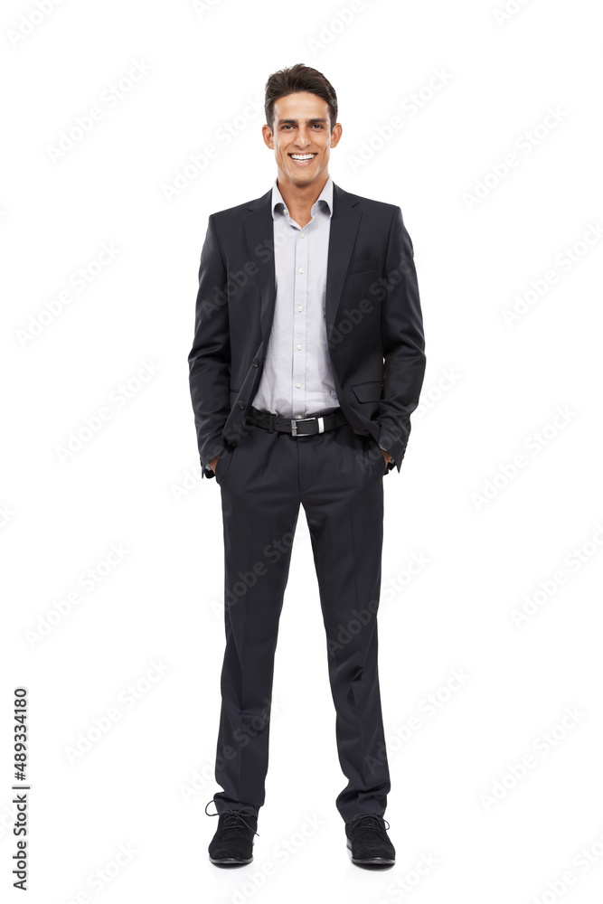 Hes a true professional. Full length portrait of a happy young businessman standing with his hands in his pockets. Hes a true professional. Full length portrait of a happy young businessman standing with his hands in his pockets.