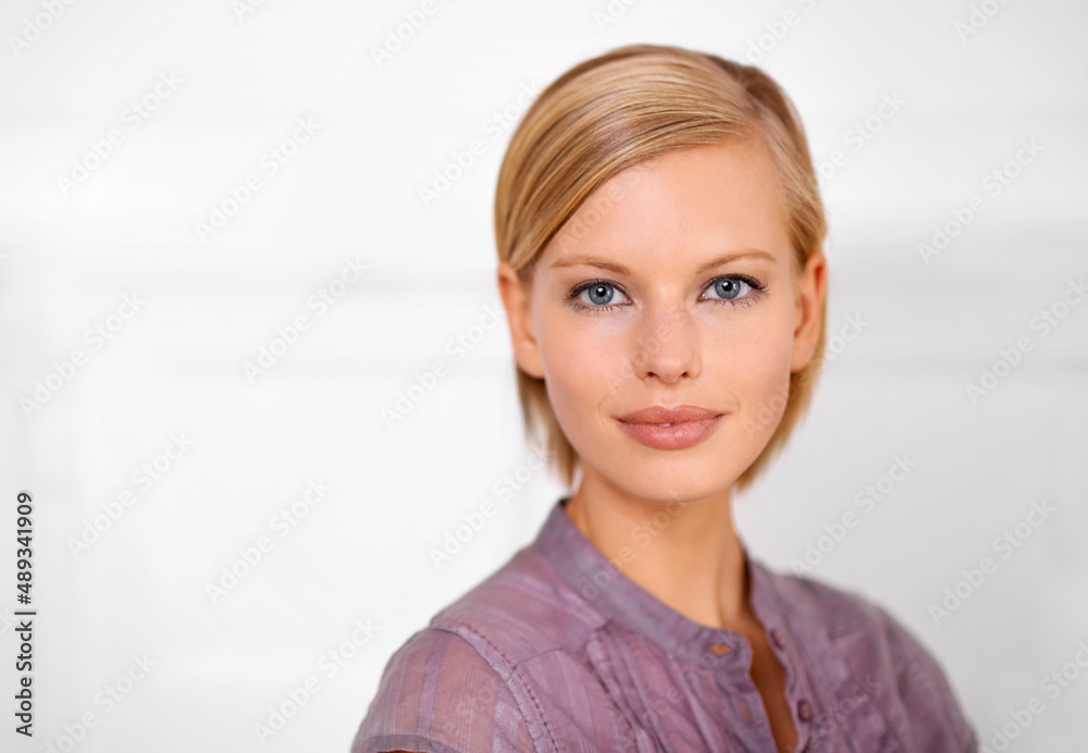Sure of herself. Portrait of a beautiful young woman dressed for the office. Sure of herself. Portrait of a beautiful young woman dressed for the office.