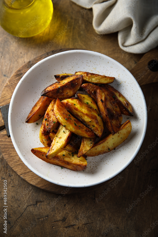 Roasted potato wedges with herbs