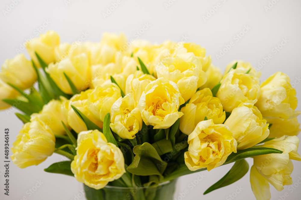 many yellow tulips in vase, floral bouquet, flower background many yellow tulips in vase, floral bouquet, flower background
